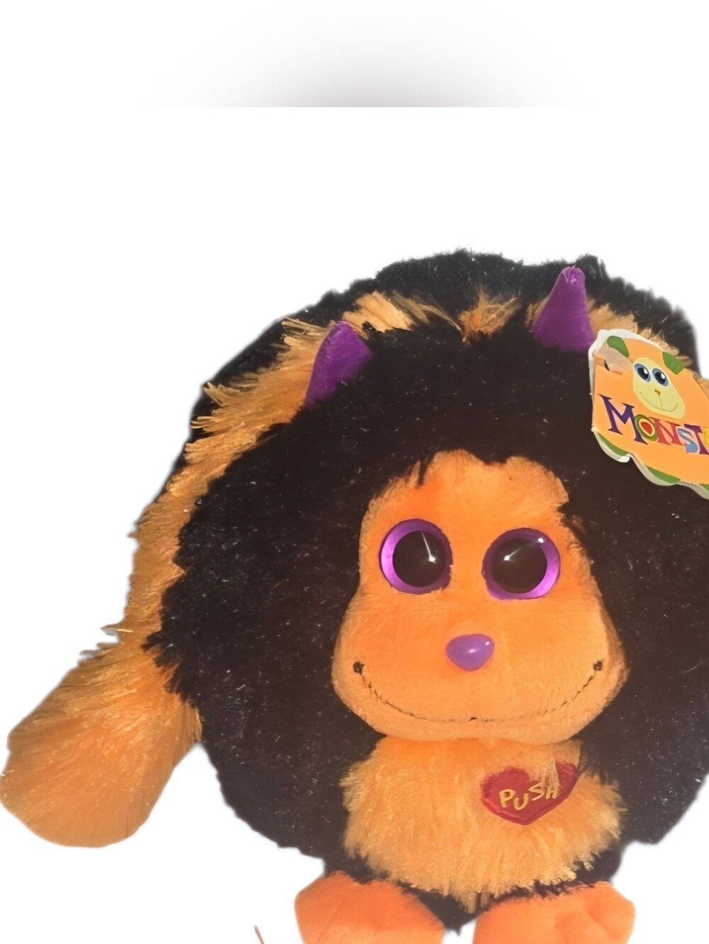 Orange & Black Plush Monster Toy with Purple Accents
